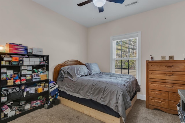 carpeted bedroom with ceiling fan