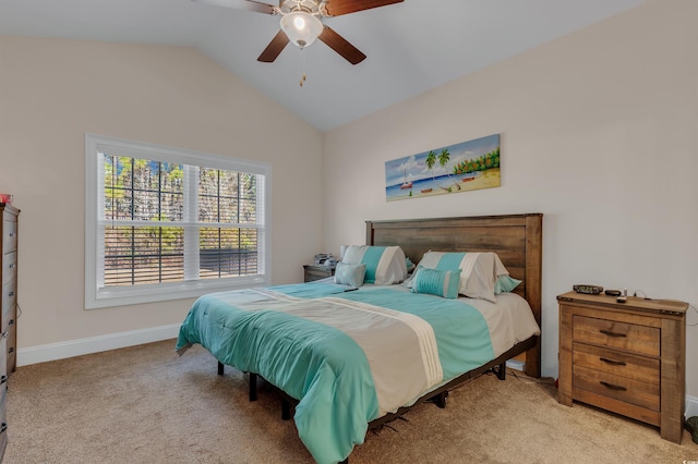 bedroom featuring lofted ceiling, light colored carpet, and ceiling fan