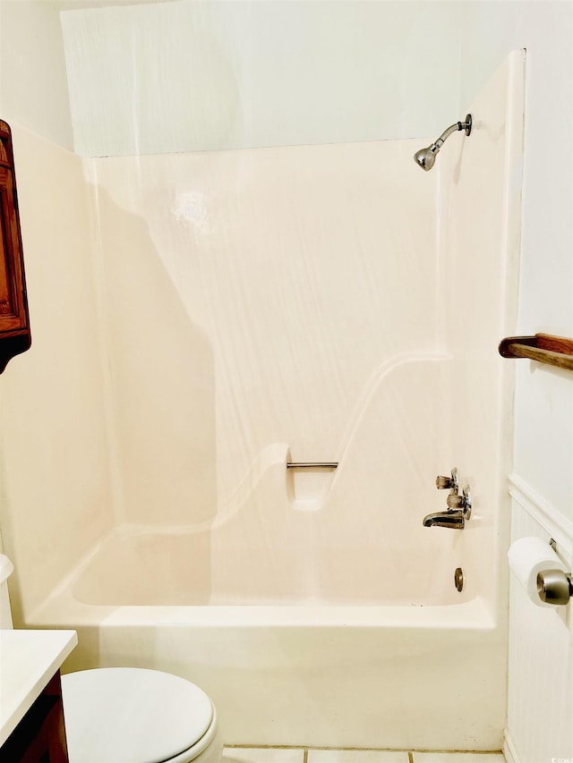 full bathroom featuring vanity,  shower combination, and toilet