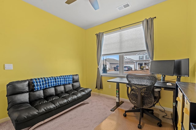 office featuring carpet floors and ceiling fan