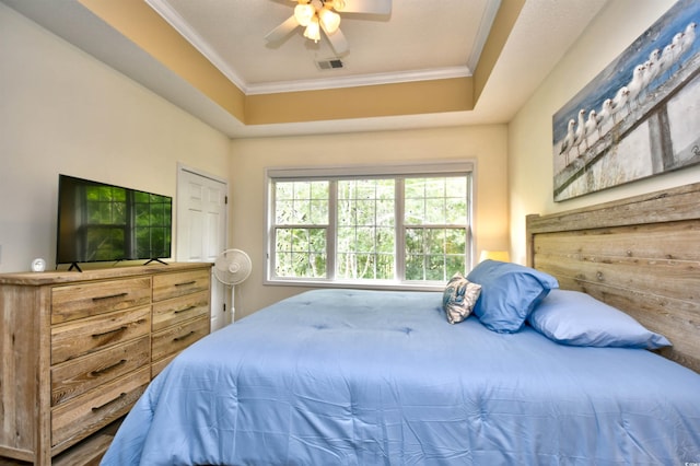 6015 Catalina Dr Unit 431, North Myrtle Beach, SC 29582 - bedroom with ceiling fan, ornamental molding, a raised ceiling, and visible vents