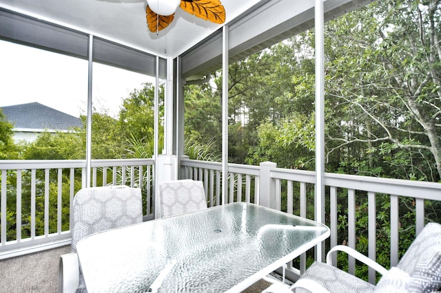 6015 Catalina Dr Unit 431, North Myrtle Beach, SC 29582 - sunroom featuring a ceiling fan and outdoor dining area