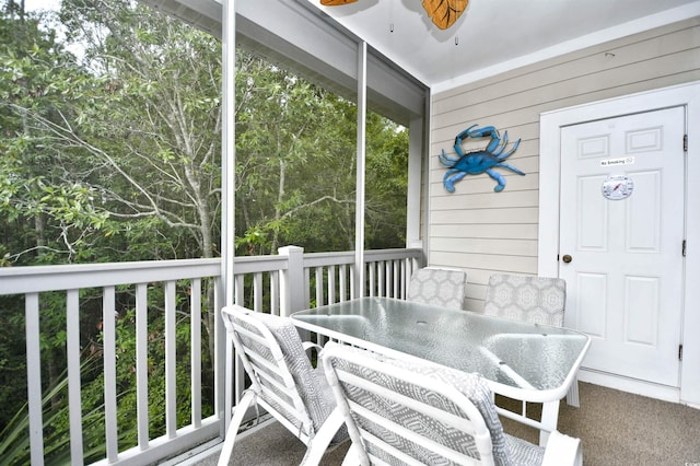 6015 Catalina Dr Unit 431, North Myrtle Beach, SC 29582 - sunroom featuring a ceiling fan and outdoor dining space