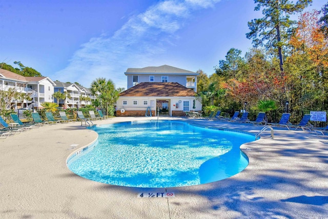 6015 Catalina Dr Unit 431, North Myrtle Beach, SC 29582 - pool featuring fence, a patio, and a residential view