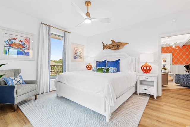 bedroom with ceiling fan, access to outside, light wood finished floors, and wallpapered walls