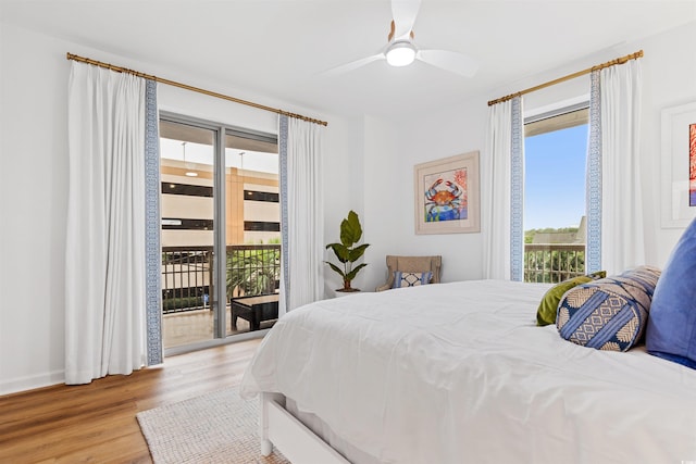 bedroom with ceiling fan, access to outside, and light wood-style floors