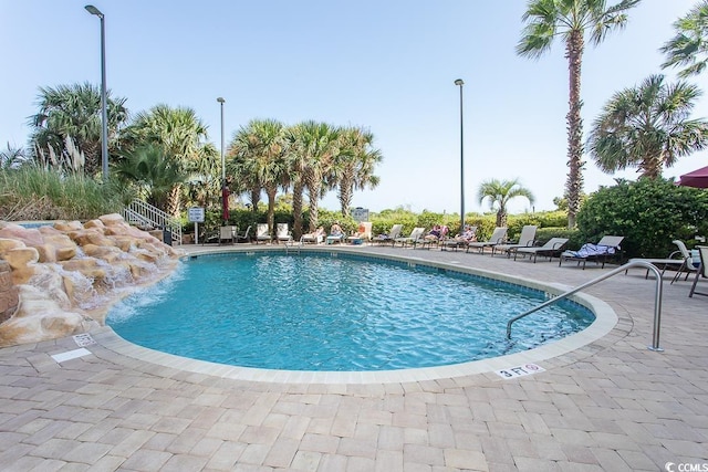 pool with a patio area