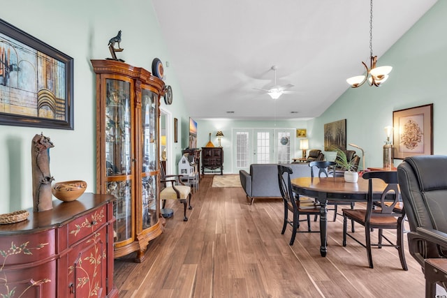 6716 Wisteria Dr, Myrtle Beach, SC 29588 - dining area featuring vaulted ceiling, light wood finished floors, and ceiling fan