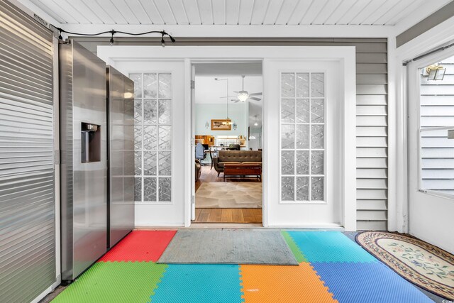 6716 Wisteria Dr, Myrtle Beach, SC 29588 - workout room featuring wood finished floors