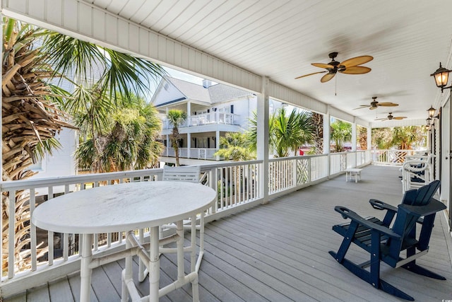 wooden terrace with ceiling fan