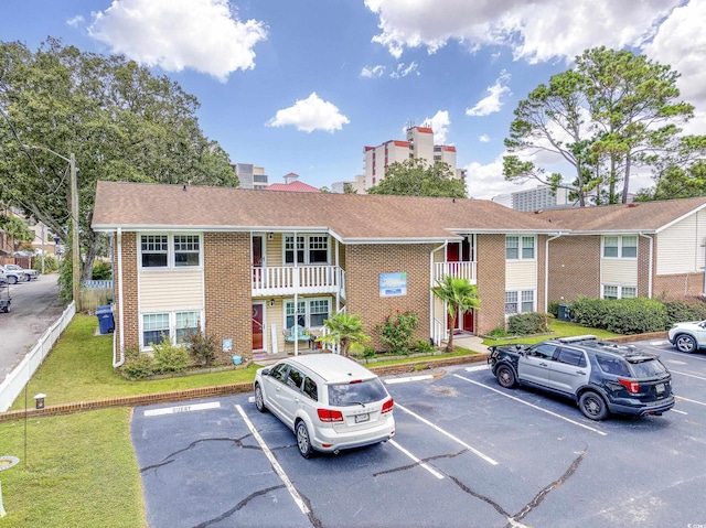 7602 Porcher Dr Unit C, Myrtle Beach, SC 29572 - view of property featuring uncovered parking