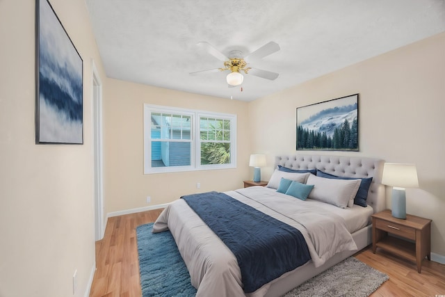 7602 Porcher Dr Unit C, Myrtle Beach, SC 29572 - bedroom with baseboards, light wood-style flooring, and a ceiling fan