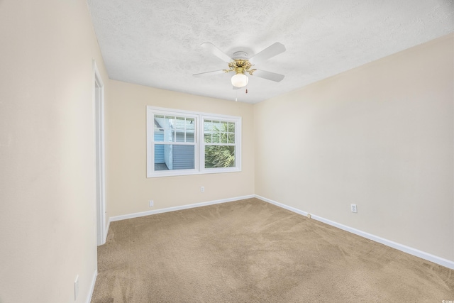 7602 Porcher Dr Unit C, Myrtle Beach, SC 29572 - unfurnished room featuring carpet floors, a textured ceiling, baseboards, and ceiling fan