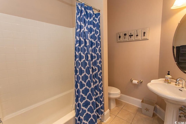 bathroom with tile patterned flooring, shower / bathtub combination with curtain, and toilet