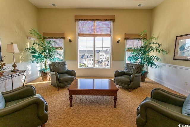 living room featuring light carpet