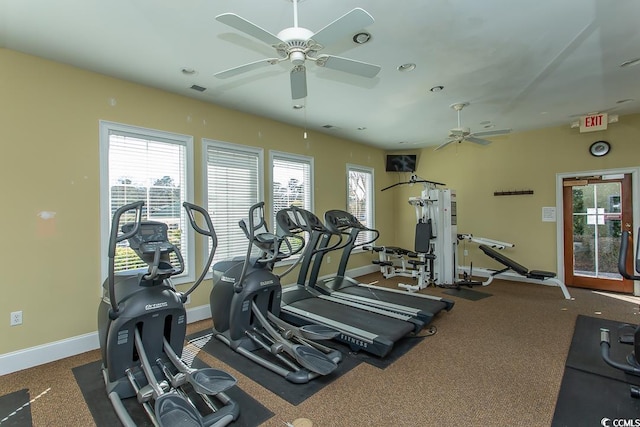 exercise room with ceiling fan