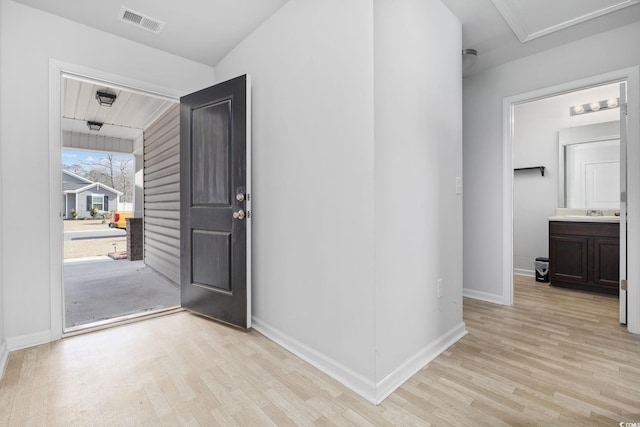 foyer entrance featuring light hardwood / wood-style flooring