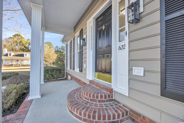 property entrance with a porch