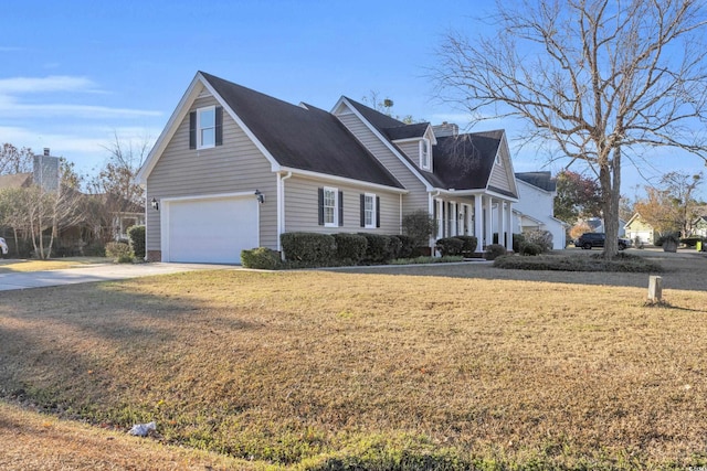 cape cod house with an attached garage, a chimney, concrete driveway, and a front yard