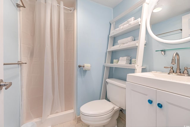 bathroom with walk in shower, vanity, toilet, and a textured ceiling