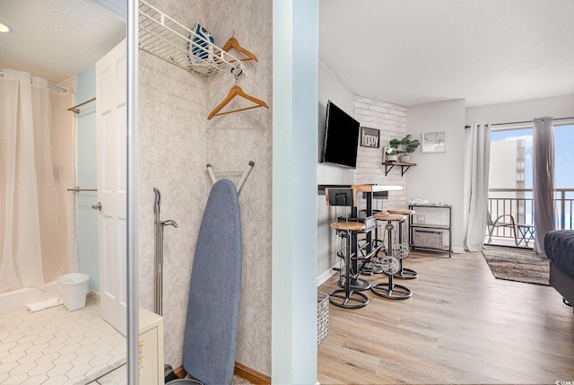 bathroom featuring wood-type flooring