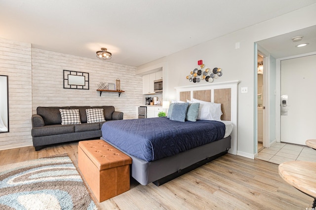 bedroom featuring light hardwood / wood-style flooring