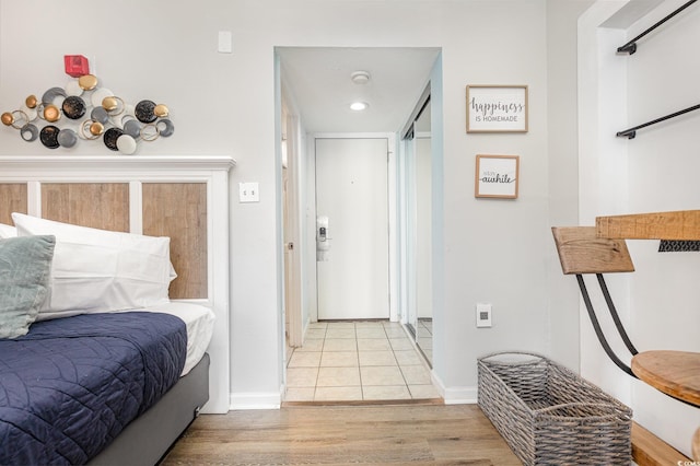 bedroom with light hardwood / wood-style floors