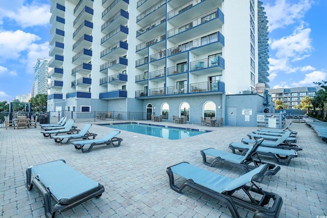 view of pool featuring a patio area