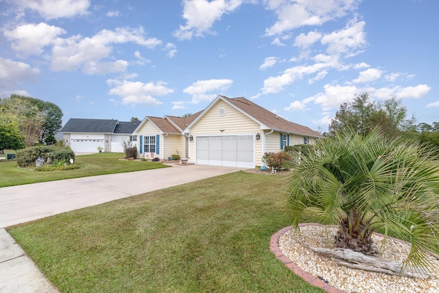 ranch-style home with a garage and a front lawn