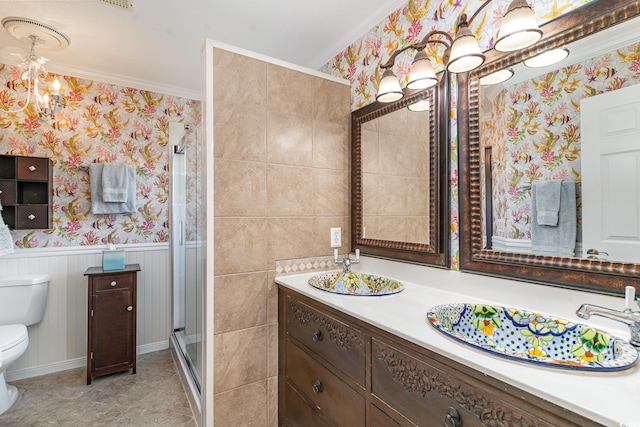 bathroom with walk in shower, toilet, an inviting chandelier, crown molding, and vanity