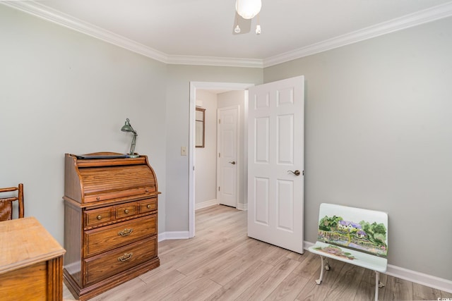 interior space featuring ornamental molding and light hardwood / wood-style flooring