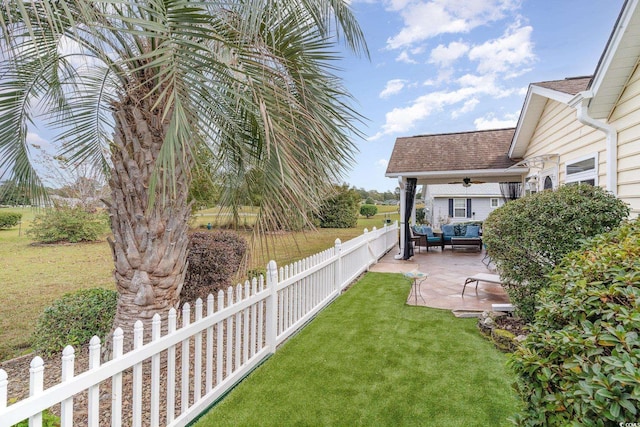 view of yard featuring an outdoor living space and a patio