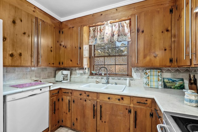 kitchen with tasteful backsplash, dishwasher, sink, and ornamental molding