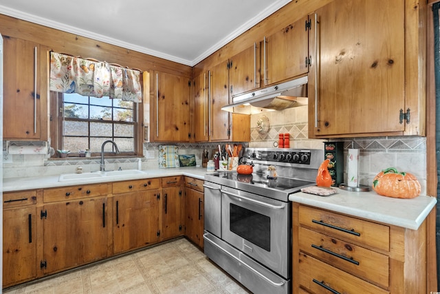 kitchen with crown molding, double oven range, backsplash, and sink