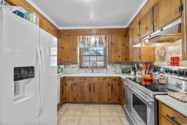 kitchen featuring sink, backsplash, white refrigerator with ice dispenser, electric range, and crown molding