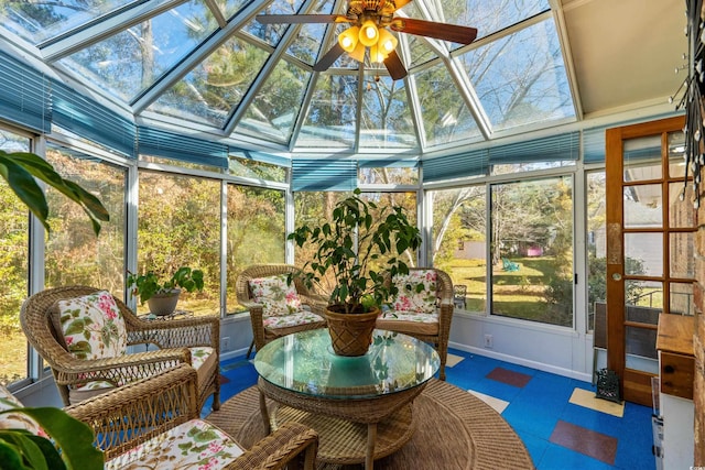 sunroom / solarium with ceiling fan