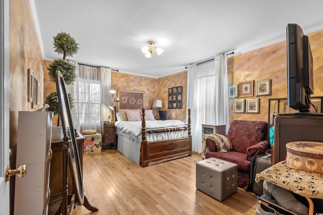 bedroom with light hardwood / wood-style flooring