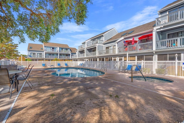 view of pool featuring a patio