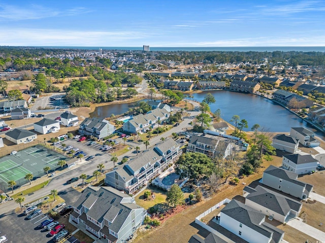 bird's eye view with a water view