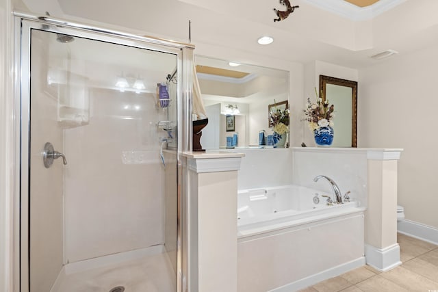 bathroom featuring tile patterned floors, ornamental molding, shower with separate bathtub, and toilet