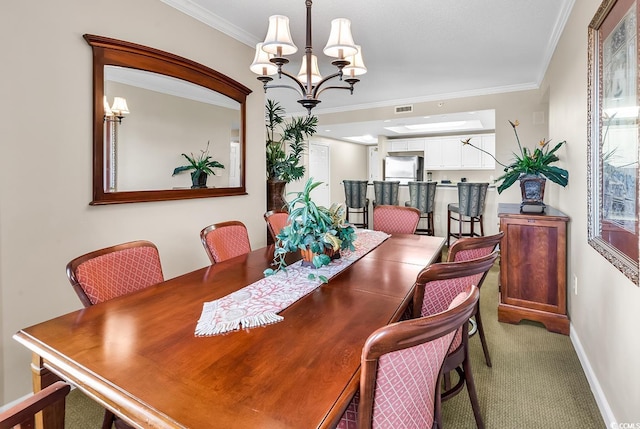 dining space with light colored carpet, ornamental molding, and a notable chandelier