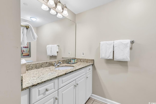 bathroom featuring vanity and tile patterned flooring