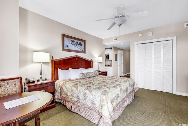 bedroom featuring carpet floors, a closet, and ceiling fan