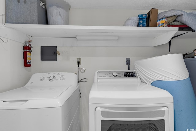 laundry room featuring separate washer and dryer