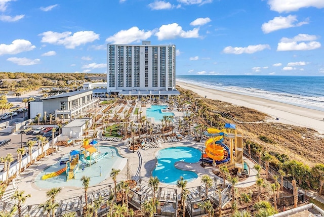 bird's eye view with a beach view and a water view