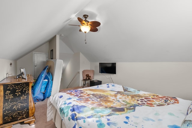 carpeted bedroom with lofted ceiling and ceiling fan