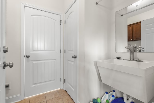 bathroom with sink and tile patterned floors