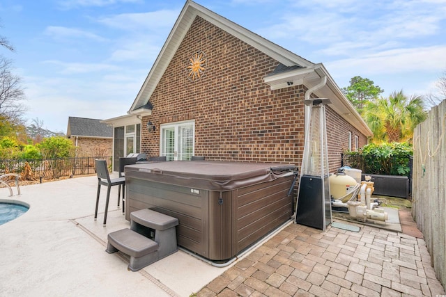 view of patio featuring a hot tub