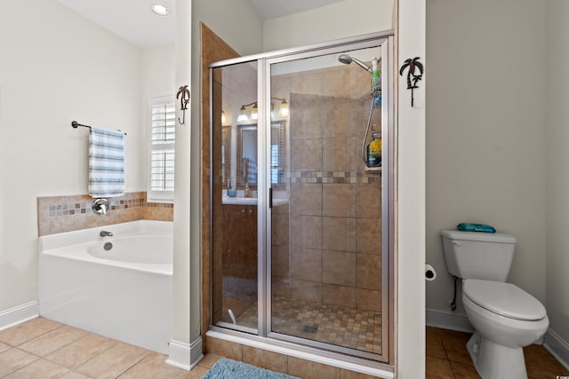 bathroom featuring tile patterned floors, plus walk in shower, and toilet