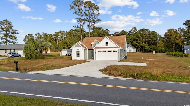 view of front facade featuring a garage and a front lawn